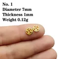 Makroaufnahme von 7mm Hohlmünzen-Abstandshalter in Goldoptik für DIY-Schmuck - Stil 1/Gold/Durchmesser 7mm