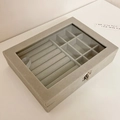 Detail of velvet jewelry box with glass lid, ring slots and secure metal clasp closure - Gray Velvet Flip Jewelry Box