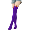 Close-up of purple over-knee Halloween socks with orange pumpkin face decorations - Solid Purple (Pumpkin Decor)