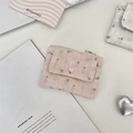 Detail of floral fabric card holder with pink heart ornament and yellow zipper pocket - Light Pink