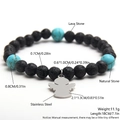 Bracciale in pietra lavica e turchese con ciondolo angelo in acciaio e misure - Turchese e pietra lavica ciondolo angelo