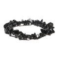 Macro detail of handmade black natural crystal chip bracelet on white background - Gold Obsidian