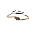 Verstellbares goldenes Hamsa-Hand-Armband mit bösem Blick und Zirkonia-Einlage - Goldene Kupferperlen Schwarzes Seil