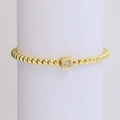 18k gold-plated beaded bracelet featuring a sparkling cubic pendant with letter N detail - Letter N