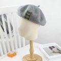 Grey wool beret with three metallic buttons shown on a mannequin head model - M (56-58cm) / Gold Buckle - Light Gray