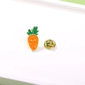 Cute carrot enamel pin for bags and clothes with a smiling face and gold butterfly clutch - Carrot (CZ0564)