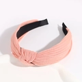 Pink knotted headband made of ribbed fabric in a stylish solid color for women - Orange Pink