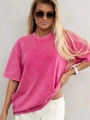 Vintage washed pink oversized cotton T-shirt in distressed American retro style on model - Washed Rose Red