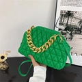 Green quilted shell crossbody bag with chunky gold chain strap and sleek finish - Green