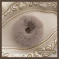 Macro detail of plush hair scrunchie in grey-purple with a 5cm inner diameter measurement - Coffee Plush