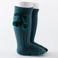 Deep green knee-high baby socks with ribbed texture and decorative cherry pom-poms - Dark Green