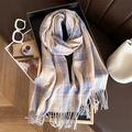 Detail of beige and blue plaid scarf with fringe tassels on a fashion display tray - Beige & Blue Plaid Type 2 (WT153-7)