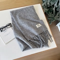 Elegante sciarpa in maglia grigia con frange classiche ed etichetta tessuta per l'inverno - Grigio Melange
