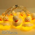 String of 10 yellow duckling LED fairy lights with 5x5cm heads and warm glow - Yellow White Duck (1.8m 10 LEDs - 2AA Constant Light Battery Box)