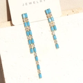 Gouden lange kwastjes oorbellen met blauwe rechthoekige en witte ronde zirkoon - 18K goud / Meer blauw