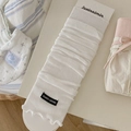 Calze bianche in maglia a coste sottili con etichetta del marchio e confezione al dettaglio - Taglia unica / Bianco