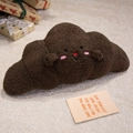 Brown croissant plush pillow with cute cartoon face on a cozy beige rug - 45cm / Chocolate