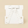 White corduroy hair bow with gold foil dots for girls on white display card - White
