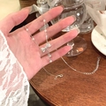 Dettaglio del ciondolo a fiocco argento con piccoli diamanti e perle su catena - Argento (Perla Fiocco Nappina)