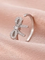 Silver bow open ring with micro-paved zircons and rectangular stone on silk cloth - Silver Zirconia Bow Tie Ring (7814)