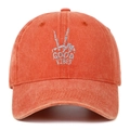 Close-up of skeleton hand embroidery and Good Vibes text on vintage orange cotton cap - Adjustable / Orange
