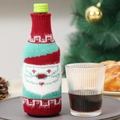Green knitted Christmas wine bottle cover featuring a Santa Claus design and fur trim - Red and Green Santa