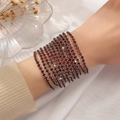 Elegante pulsera en espiral de varias capas con cristales rojos de 2,0 mm sobre plata - Plateado Multicapa Rojo Espiral