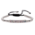 Handmade woven bracelet featuring silver copper beads and a colorful micro-pave charm - Colored Zirconia Style / Silver