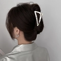Detail of a large Y2K silver hollow triangle metal hair claw with colorful rhinestones - Triangle Silver Rhinestone Style (FJ3708)