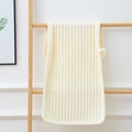 Soft cream yellow coral fleece towel with ribbed texture and white wavy edges hanging - Towel (35x75cm) / Yellow