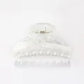 Elegant medium hair claw clip in clear acrylic with white lace pattern and gold spring - Lace White