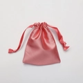 Pink satin drawstring pouch with smooth silk texture for cosmetic storage packaging - Watermelon red
