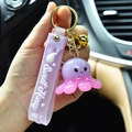 Cute purple resin octopus keychain with LED light effect and Sweet Honey wrist strap - Purple