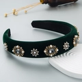 Baroque velvet headband with vintage rhinestones and pearls on a white podium - Dark Green