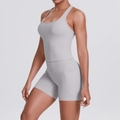 Detail of light gray high-waisted fitness shorts with premium breathable fabric - S / Top And Bottom / Frost Grey
