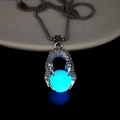 Detailed view of silver dragon claw pendant holding a glowing blue orb on a chain - Blue