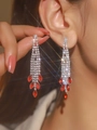 Elegant long silver fringe earrings with white rhinestones and red pear-shaped gems - Silver Stepped Ruby Style