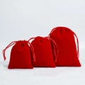 Three sizes of red velvet drawstring pouches for jewelry storage and gift packaging - Red
