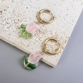 Macro detail of tulip pendant earrings with pink glass petals and 18K gold hoops - Pink