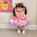 55cm lifelike reborn doll with brown pigtails and pink tulle dress on white background - 55cm/Full Vinyl / Pink and Purple Gradient Dress Style