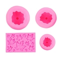 Pink silicone mold set featuring 3D pumpkin and maple leaf shapes for DIY candle making - Four-Piece Set / Pink