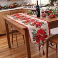 Christmas table runner with red poinsettia print and tassels on a cozy dinner table - Christmas Flower Style / 173x34cm