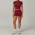 Women's burgundy brushed yoga set featuring a tight crop top and high waist sports shorts - S / Top And Bottom / Short Sleeve + Shorts / Cherry Red