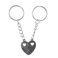 Close-up of gunmetal magnetic split heart keychains with engraved BEST FRIENDS text - Black (Pair)