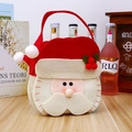Kerstman vilten geschenkzakje met handvat en hulstblad voor vakantiesnoepjes en meer - Kerstman
