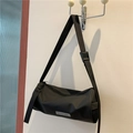 Sporty black cylinder crossbody bag in matte nylon with adjustable shoulder strap - Black