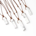 Five white turquoise stone rectangle pendants with brown braided cord necklace variant - Howlite