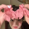 Detailed view of pink shell heart earrings with layered fabric petals on female model - 12# 925 Sterling Silver Earring Post-Pink-Heart Fabric Petal Tassel