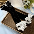 Detail of vintage black long gloves featuring elegant white ruffled puff sleeve cuffs - ST182 Black Velvet Hydrangea Long Sleeves
