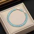 Tennis bracelet featuring sky blue rectangular zircons and silver safe-lock clasp - White Gold Tone Sea Blue (With Extension)